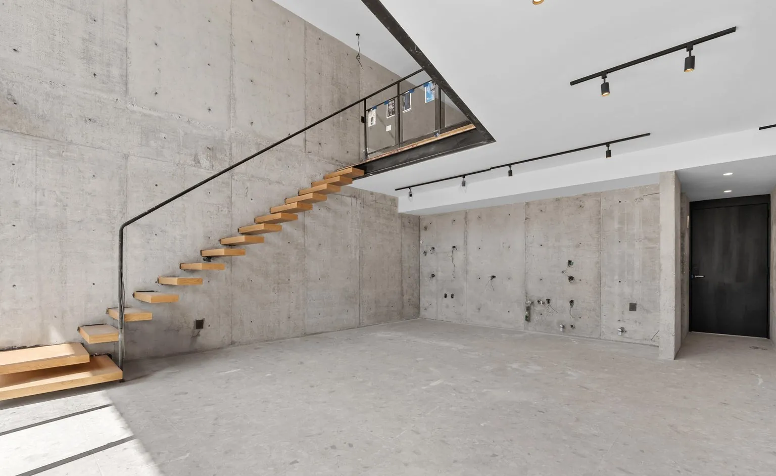 Concrete great room bathed in light