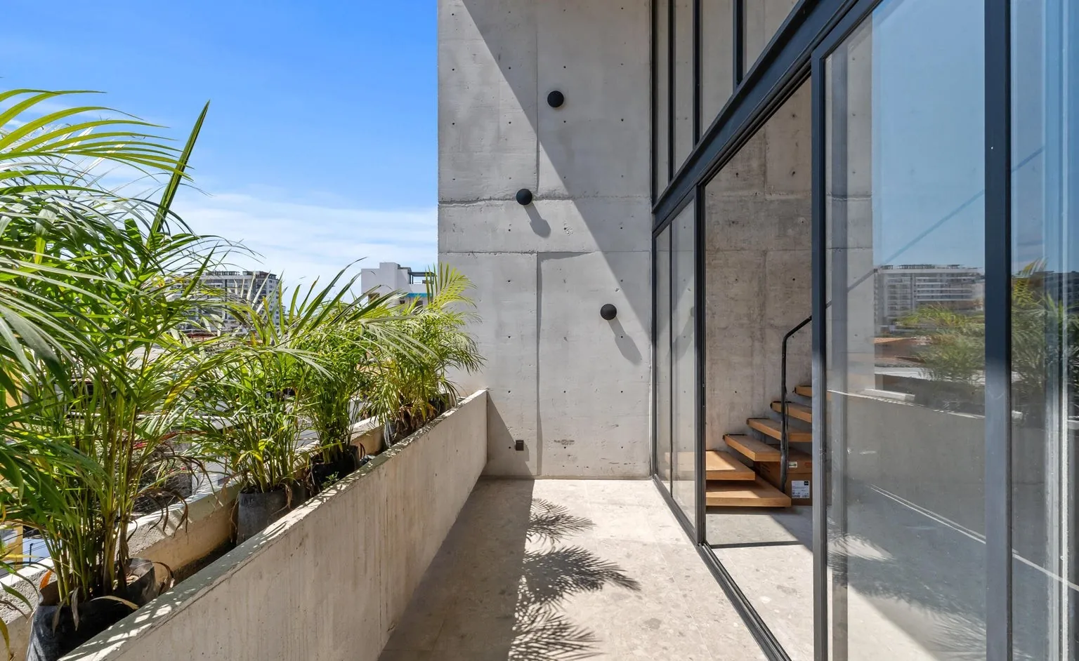 Terrace with planter and port view
