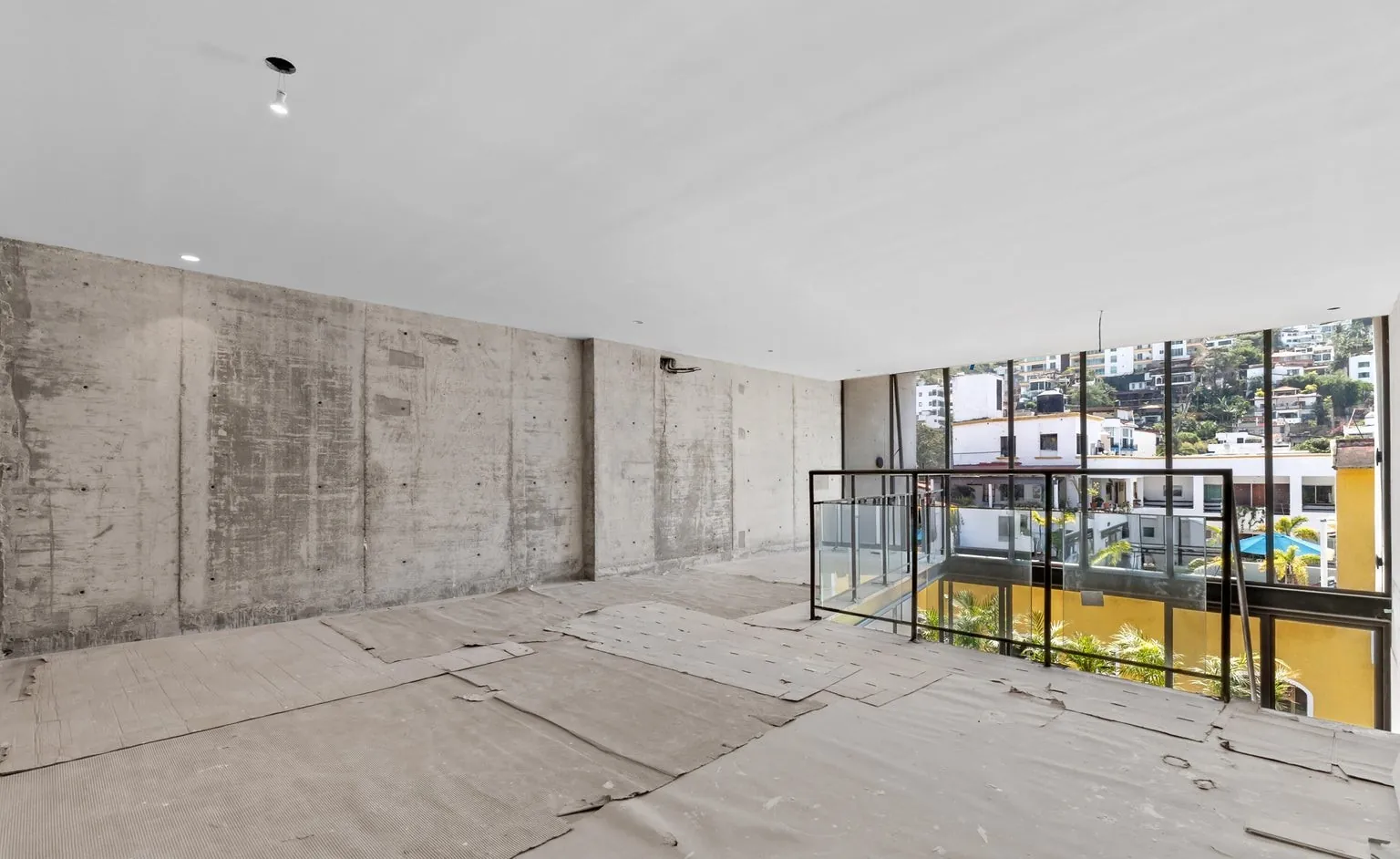 Floor-to-ceiling windows with city view
